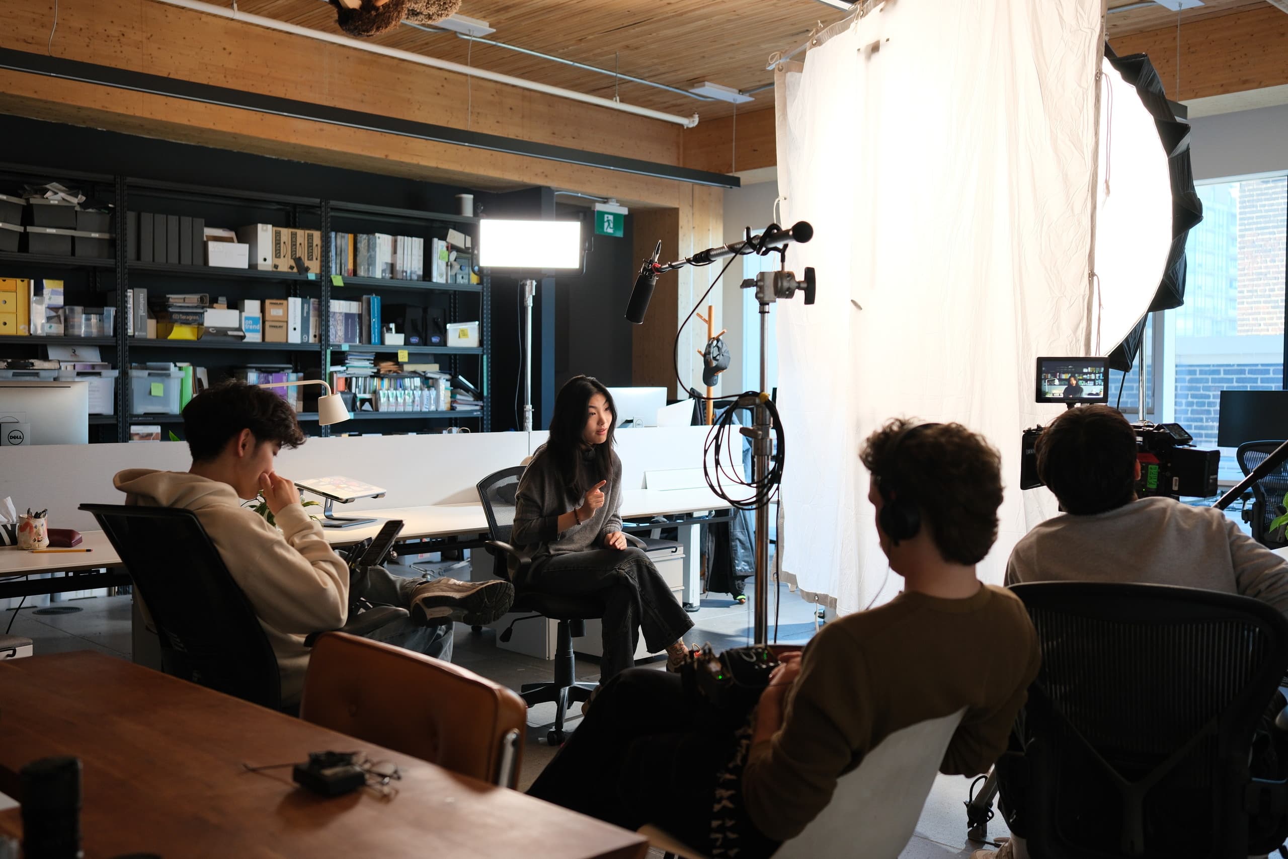 Interview setup on location — key light, boom and diffusion flag